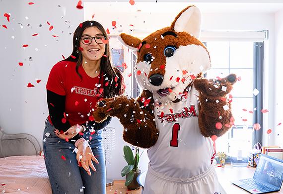 Image of student advocate Megan Doshi with Frankie.